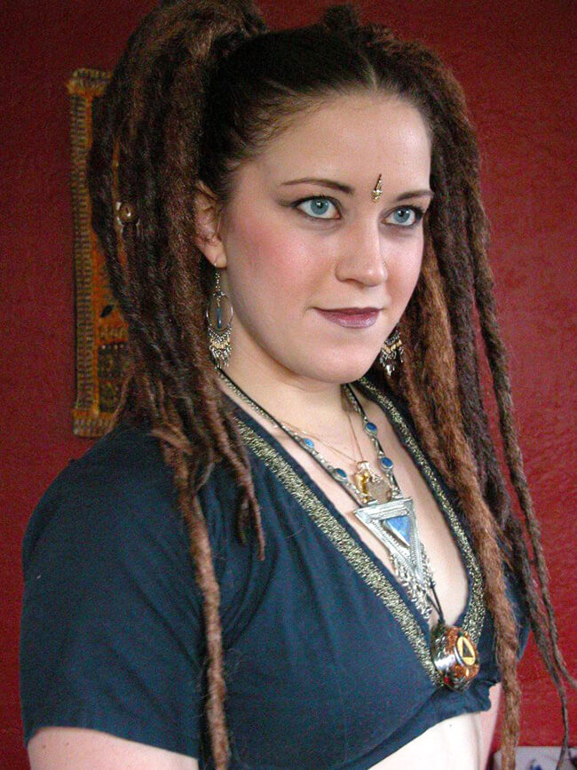 Layla Dudley, loc artist with long dread locs